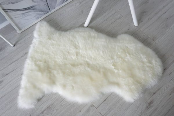 Muffin and Poppy sheepskin cat beds